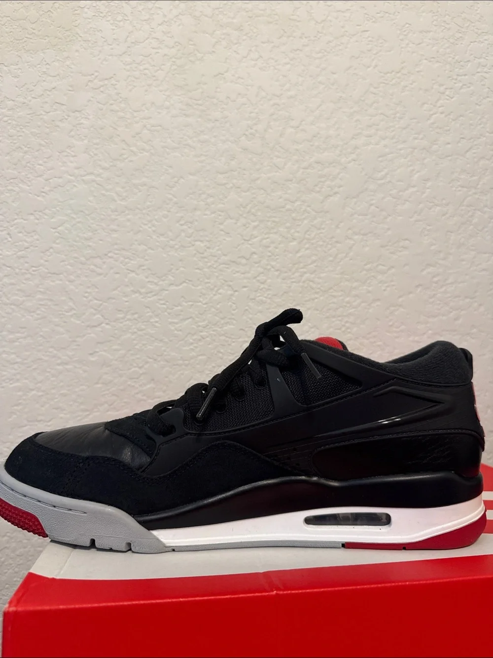 Jordan 4 RM Bred Men's Black and Red Athletic Sneakers